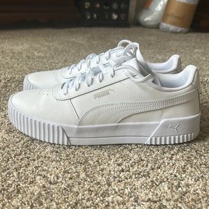 White Puma tennis shoes.  Size 10, like new!